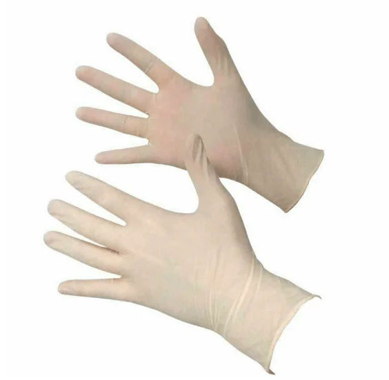 Pair of beige disposable gloves on a white background