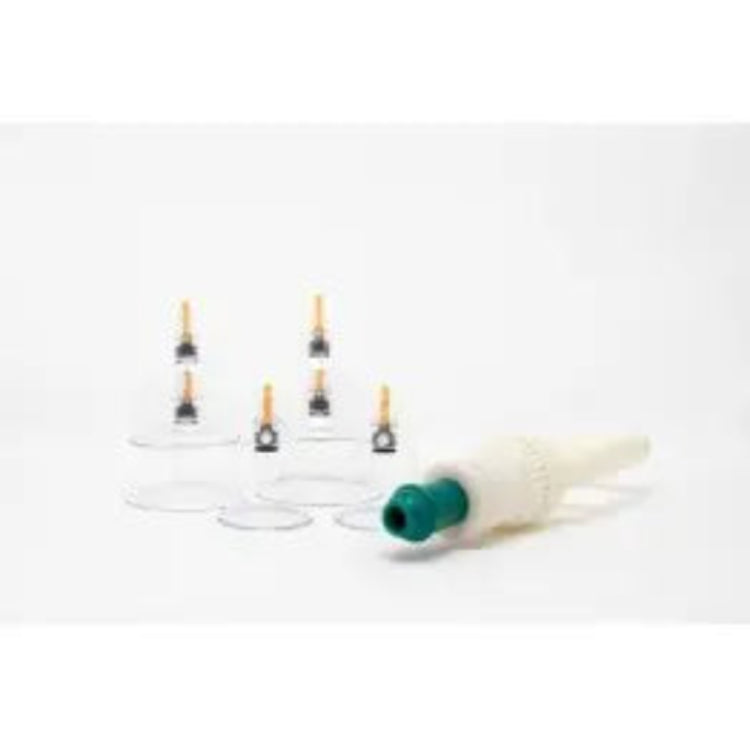 White cylindrical object with a green tip on a white background