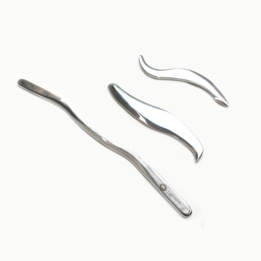 Two metal hair curling irons on a white background