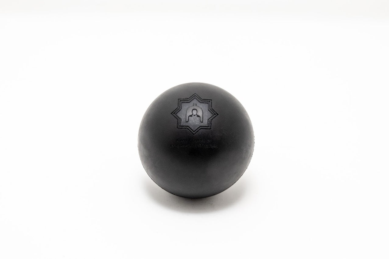 Black massage ball with a logo on a white background