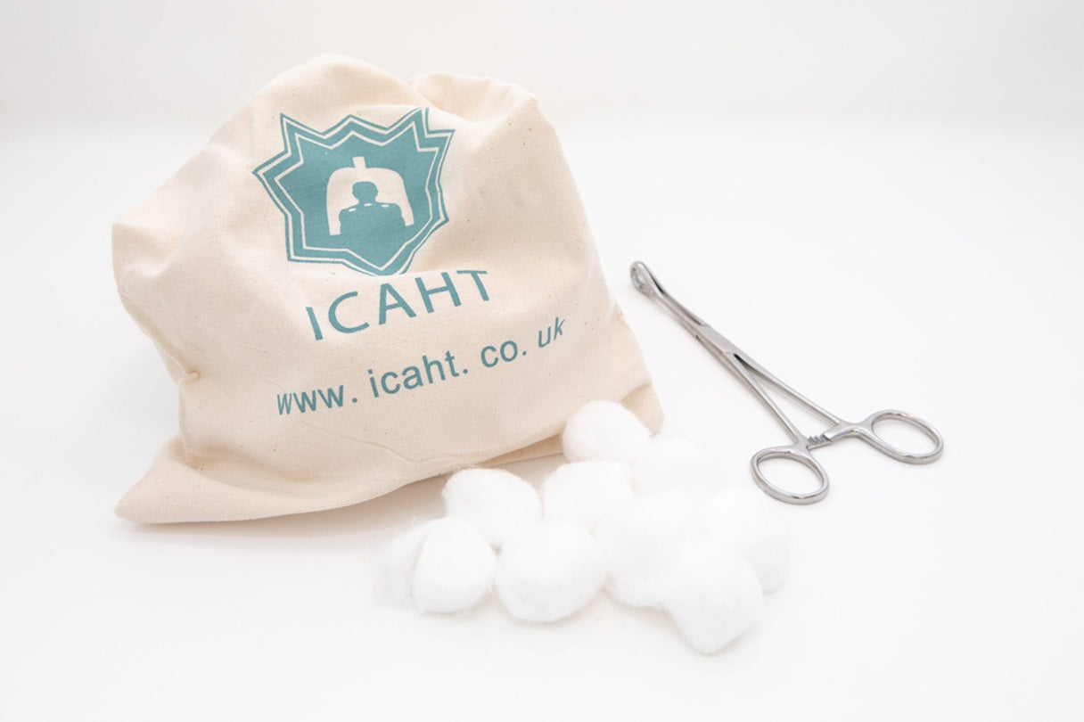 Beige drawstring bag with 'ICAHT' logo and text, scissors, and cotton balls on a white background