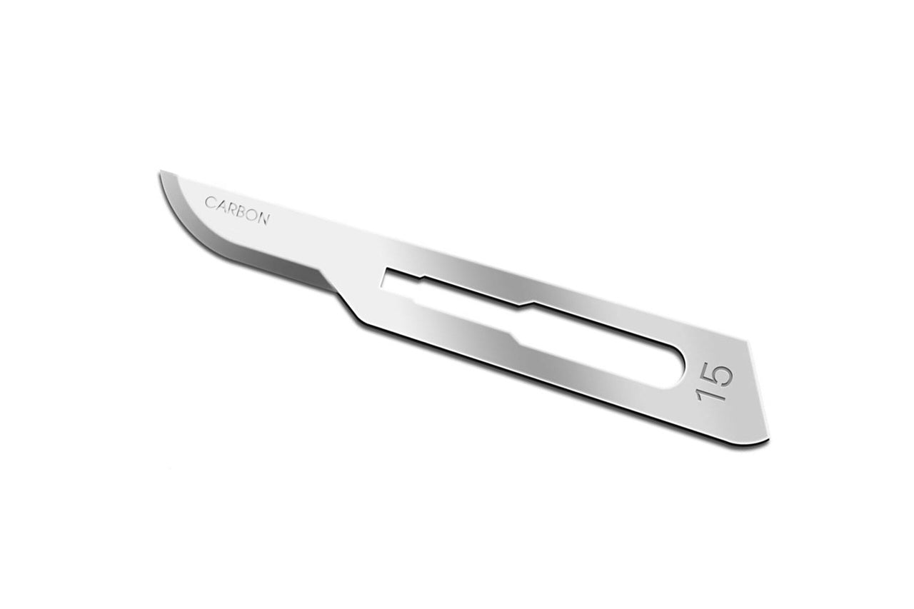 Stainless steel scalpel blade on a white background