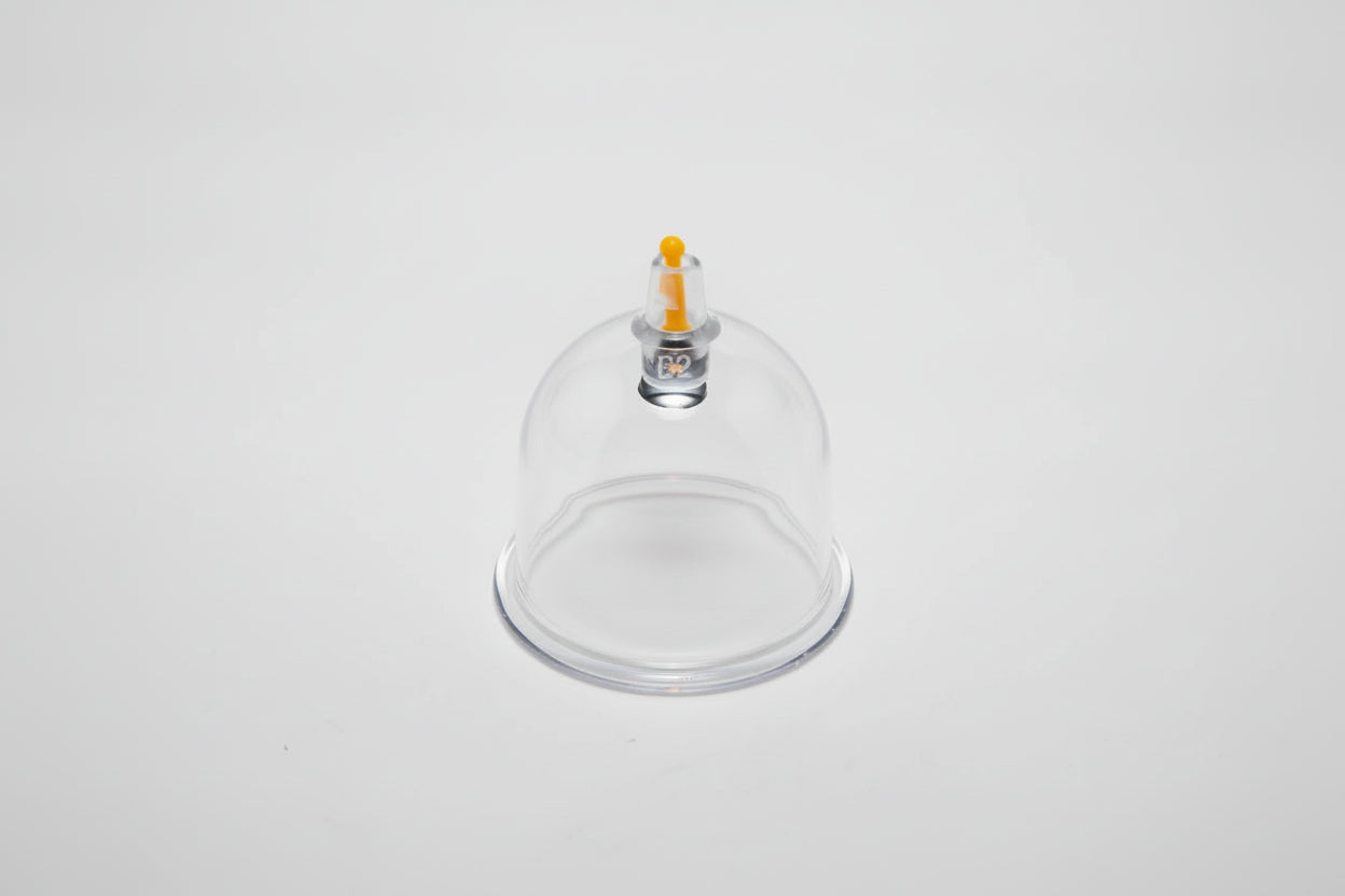 Cupping cup with a small air release pressure point at the top on a white background