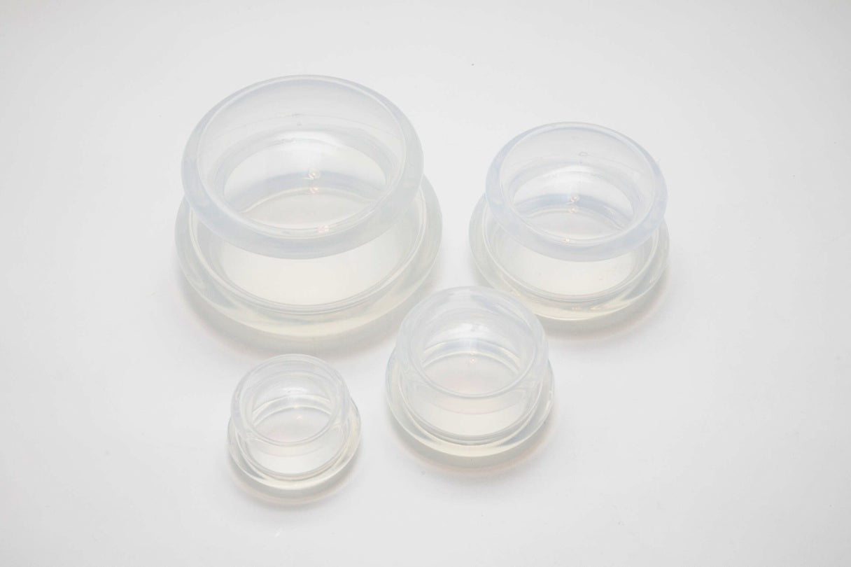 Set of clear plastic containers on a white background