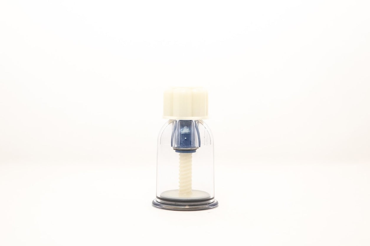 Vacuum cupping therapy device on a white background 